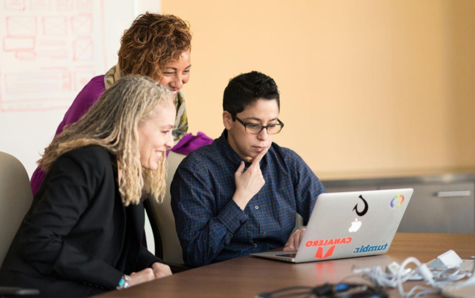 Investment professionals analyzing market data and portfolio performance